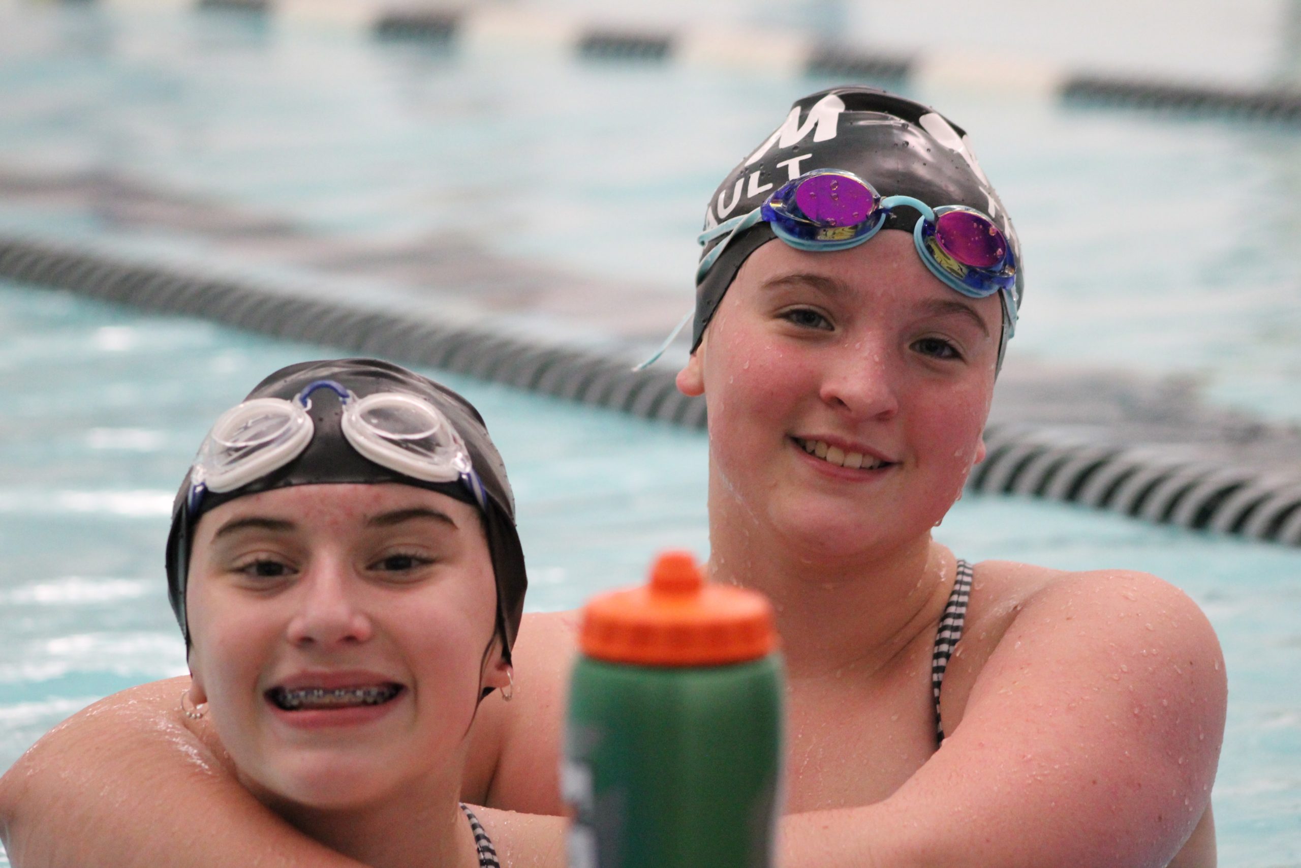 Female youth swim team swimmers