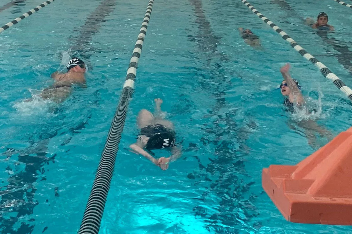 Five swimmers make use of the indoor olympic pool with lanes at the Valley Shore YMCA